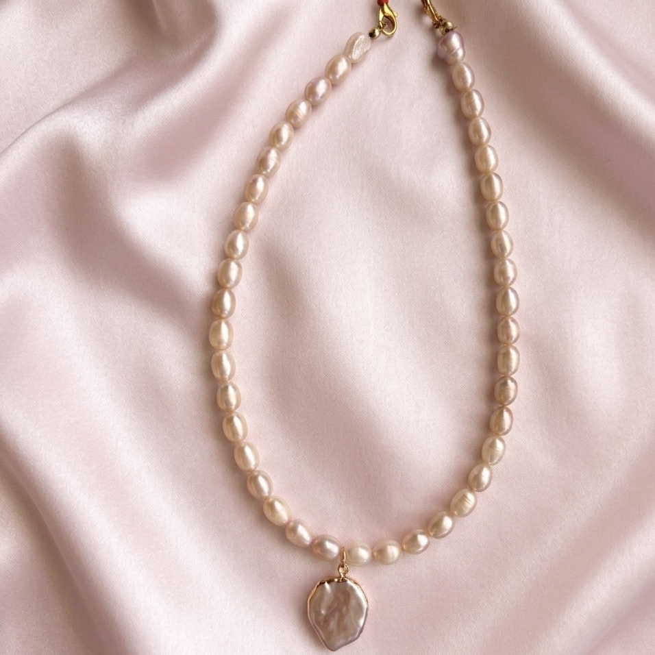 Freshwater pearl with a pearl pendant